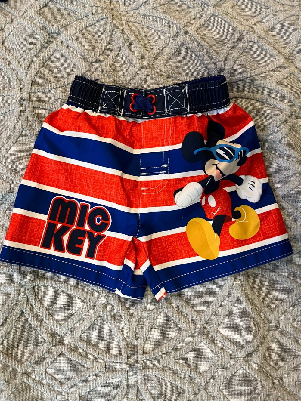 Mickey Mouse Red & Blue Striped Swim Trunks and blue and orange carters bubdle!